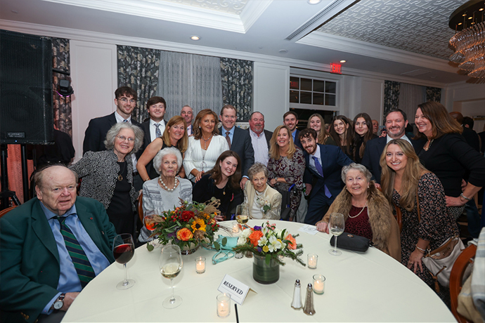 Our honoree Jane Young with supporting members, friends and family.